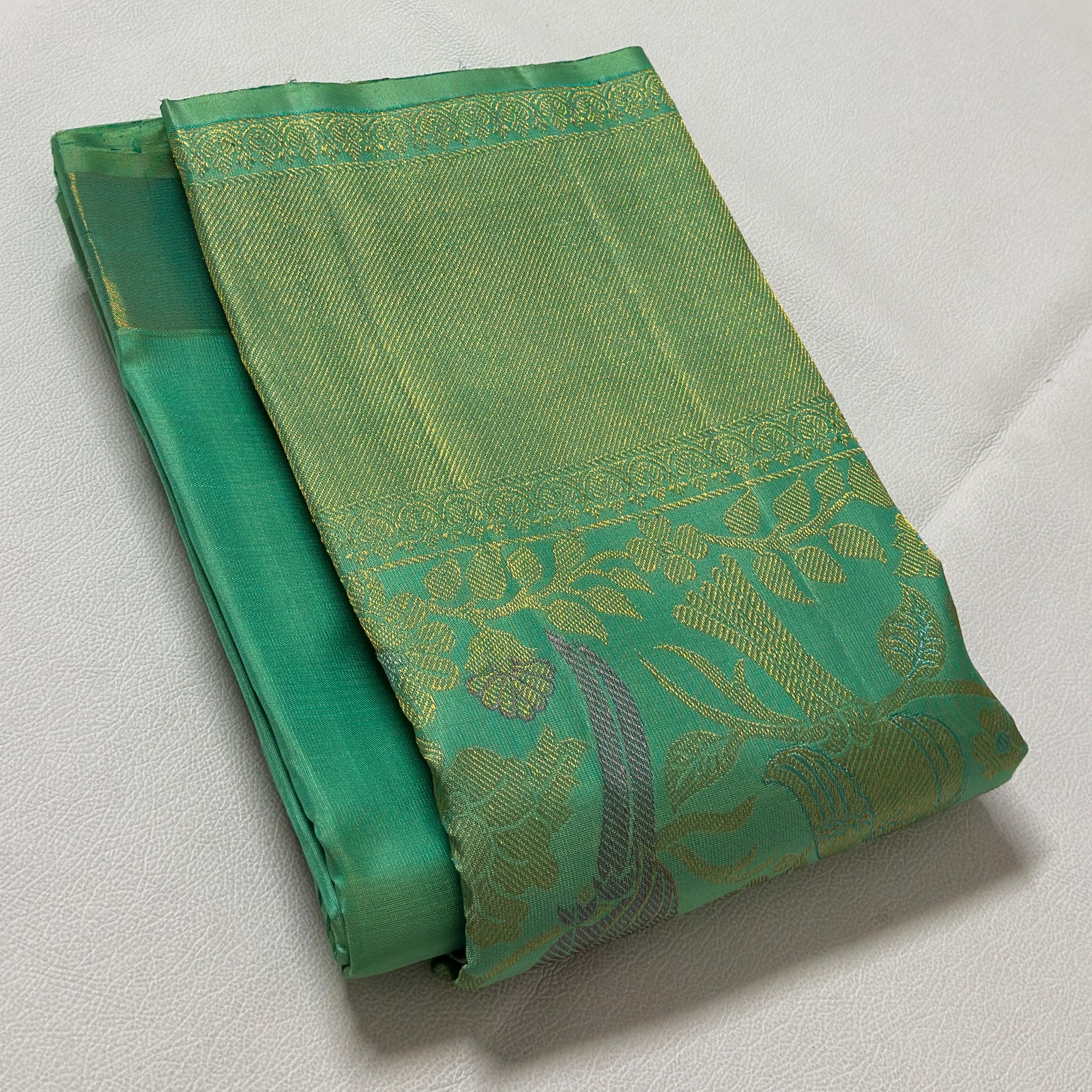 Mayura Vaibhavi: Mint Green & Wine Silk Saree with Peacock Zari Border